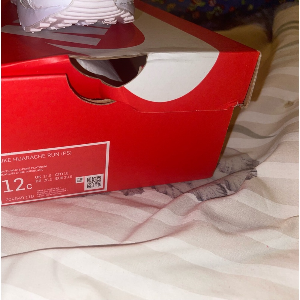 Brand new white 12c Nike Hurraches. Never worn. Perfect condition.